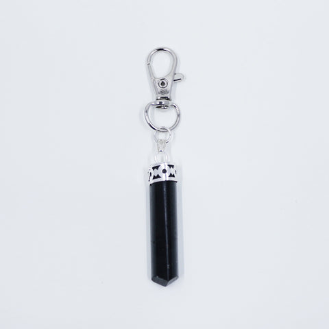 Image of Black Tourmaline energy crystals on necklaces and lobster clasp clip pendants from Hound and Friends