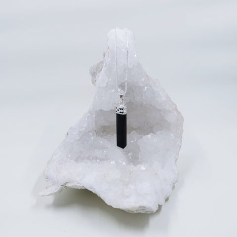 Image of Black Tourmaline energy crystals on necklaces and lobster clasp clip pendants from Hound and Friends